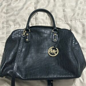 Michael Kors black handbag.